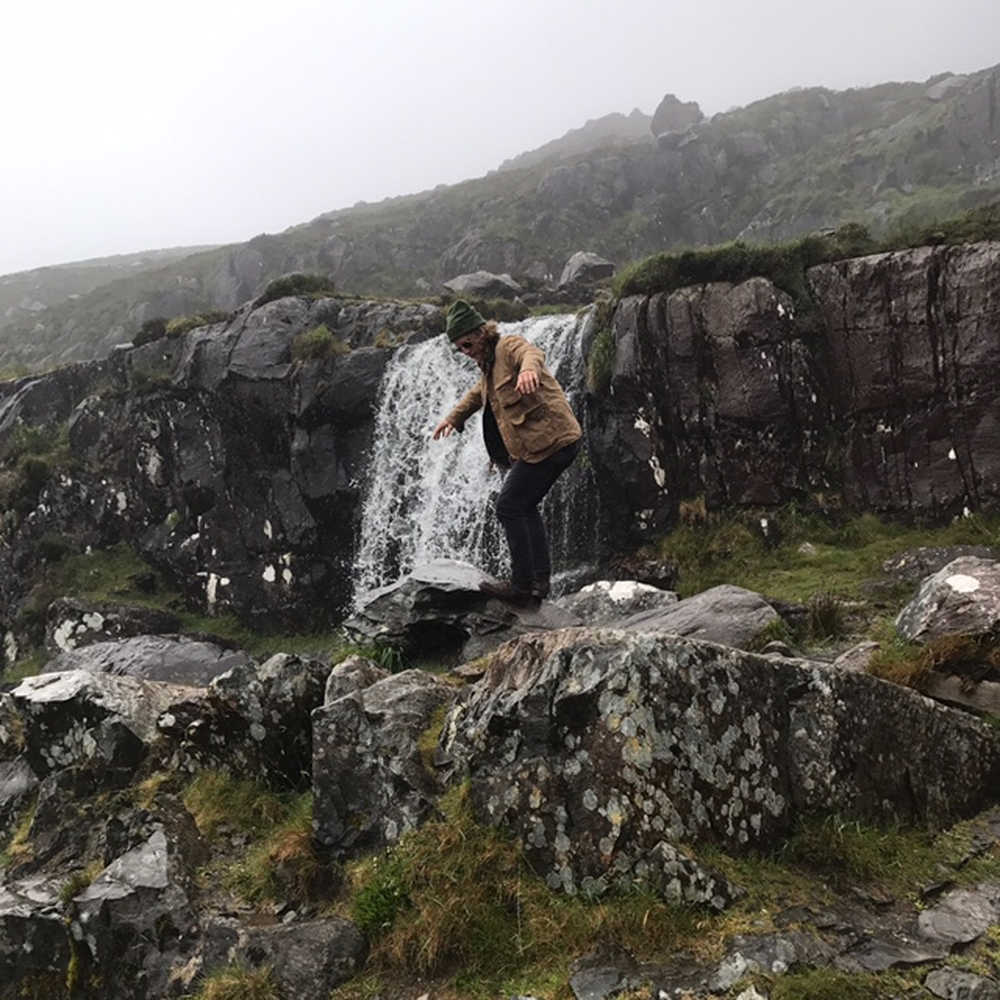 Jake McDorman at a waterfall in Ireland