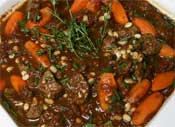 Balsamic braised beef with roast carrot and white beans