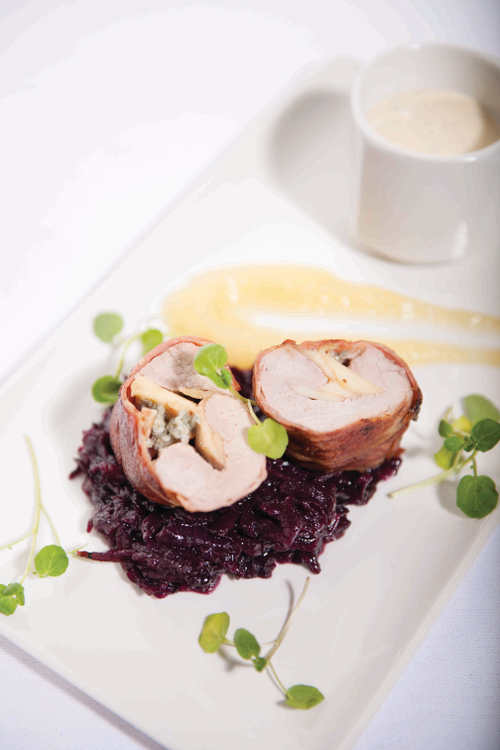 Stuffed Pork Fillet with Blue Cheese & Bramley Apple wrapped in Parma Ham with a Co. Armagh & Mustard Cream Sauce