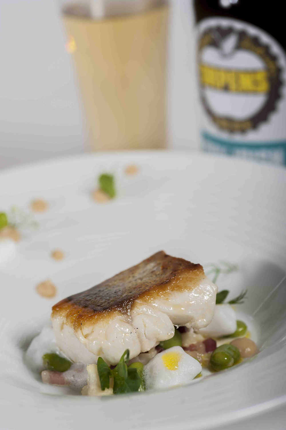 Noel McMeel’s Pan Seared Fillet of Irish Hake, Roast Cauliflower Purée, Broad Beans, Bacon Lardons & Vanilla Foam