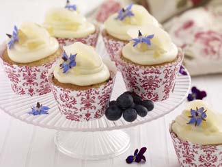 Oaty Blueberry Muffins with Ginger and Pear Frosting 